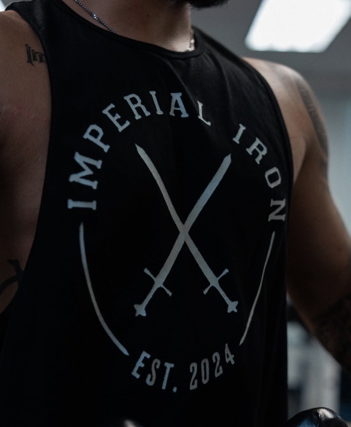 Close up of the Imperial Iron crossed swords tank top